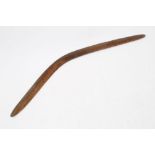 19th century Australian Aboriginal carved boomerang, 76cm long.