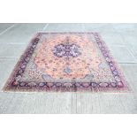 Very large Eastern carpet with salmon-pink ground,