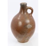 17th century Rhenish stoneware wine bottle of bulbous form, with string neck,