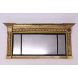 George IV giltwood triple plate overmantel mirror with reeded ebonised slip and beaded surround,