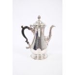 George III silver coffee pot of baluster form, with engraved full armorial shield,