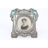 Edwardian silver photograph frame in the style of Archibald Knox,