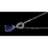 Diamond and synthetic sapphire pendant with a pear cut synthetic blue sapphire with diamond set