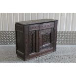 Unusual carved oak food cupboard, allover ornate chip-carved panels,