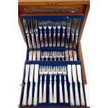 Set of eighteen pairs of Victorian silver shell and thread pattern fish-eaters with silver blades,