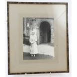 HM Queen Mary - signed presentation photograph of Her Majesty in white dress and hat,