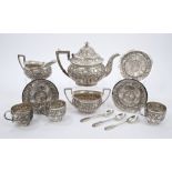 Late 19th century Kashmiri silver three piece tea set - comprising teapot of half-fluted form,