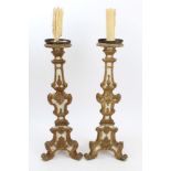 Pair of 19th century Italian Florentine carved gilt and white painted gesso altar candlesticks of