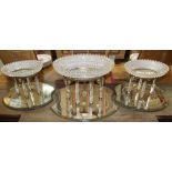 Fine garniture of three 19th century cut glass and ormolu mounted table centre pieces - each oval