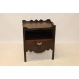 George III mahogany bedside cupboard, the gallery top with integral pierced carrying handles,