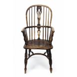 Early 19th century ash and elm stick back Windsor chair, the arched back with pierced splat,