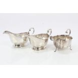 Pair 1930s silver sauce boats of faceted form,