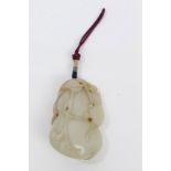 Antique Chinese jade pebble carving pale-green stone pierced and carved in low relief with