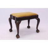 Queen Anne-style lacquered and gilt heightened stool of serpentine outline,