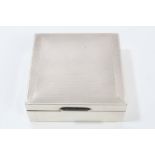 Contemporary silver cigarette box of square plain form,