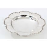 1940s silver dish of flower-head form, with dished centre and raised border,