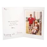 TRH The Prince and Princess of Wales - signed Christmas card with twin gilt embossed Royal ciphers