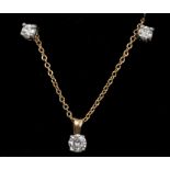 Diamond single stone pendant and pair of diamond single stone stud earrings,