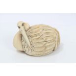 Late 19th century Japanese netsuke of a heron pruning its feathers, signed, 4.