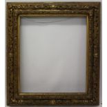 An ornate 19th century carved wood and gesso gilt frame - internal size 82cm x 71cm