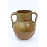 Antique glazed pottery vessel, possibly American, ribbed bulbous twin-handled form,