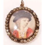 18th century English School miniature on ivory of a boy wearing a black hat, lace collared shirt,