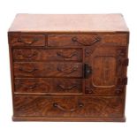 Good 19th century Japanese burr elm and metal mounted table cabinet with arrangement of short