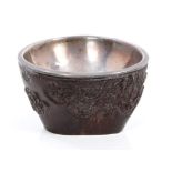 Fine Chinese Qing period carved wood or nut libation cup with silver liner,