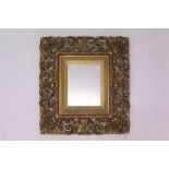 19th century Florentine carved gilt gesso wall mirror,