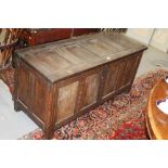 Early 18th century panelled oak coffer,