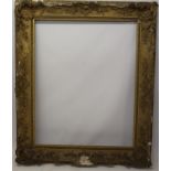 A large 19th century gilt and gesso frame - internal size 127cm x 101cm