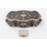 Edwardian silver trinket box of shaped rectangular form,