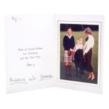 TRH The Prince and Princess of Wales - signed Christmas card with twin gilt embossed Royal ciphers