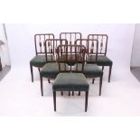 Set of eight George III mahogany and line-inlaid dining chairs in the Sheraton style,