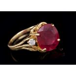 Ruby and diamond ring with a cushion cut ruby measuring approximately 12.0mm x 11.4mm x 4.