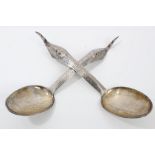 Pair late 19th / early 20th century Far Eastern white metal serving spoons with chased foliate
