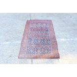 Eastern rug - navy field with allover branchwork ornament in multiple borders,