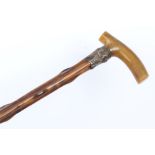 Victorian rhinoceros horn-handled cane, the silver collar marked for W. F.