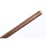 19th century Continental gold mounted hardwood cane, tapering form,