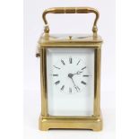 Late 19th century French repeating carriage clock in brass case with white enamelled dial and