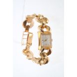 1950s ladies' Luxe rose gold (18ct) bracelet wristwatch, the square dial with baton numerals,