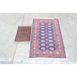 Small Eastern rug - with wavy field and two rows of conjoined quartered medallions in multiple