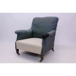 Early 20th century Howard-style deep armchair raised on square tapered legs and ceramic castors