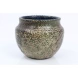 Late 19th century Martin Brothers pot with incised floral scroll decoration,