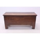18th century elm six-plank coffer, hinged solid top enclosing interior with lidded candle box,