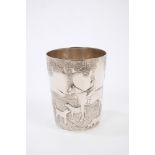 Victorian silver beaker of tapering cylindrical form, with embossed hunting scene (Birmingham 1870),