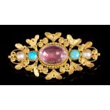 Regency brooch with a central pink foil-backed stone flanked by turquoise cabochons and half pearls
