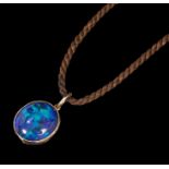 Edwardian black opal pendant, the oval cabochon measuring approximately 13mm x 11.5mm x 4.
