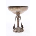 1920s silver tennis trophy in the form of a shallow pedestal cup,