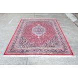 Large Eastern rug - centred by concentric hexagonal medallions in busy spandrels and multiple
